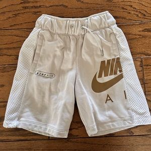 Youth, Nike Shorts. Sweatshirt material. Light tan in color. Size S